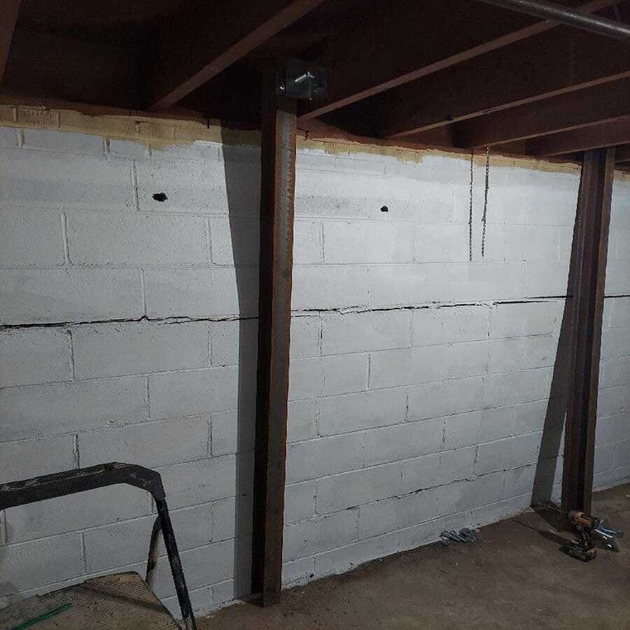 damaged foundation walls causes walls to bow out